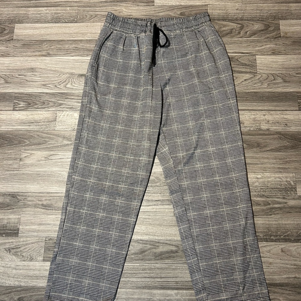 Gray plaid trousers with elastic waistband and drawstring